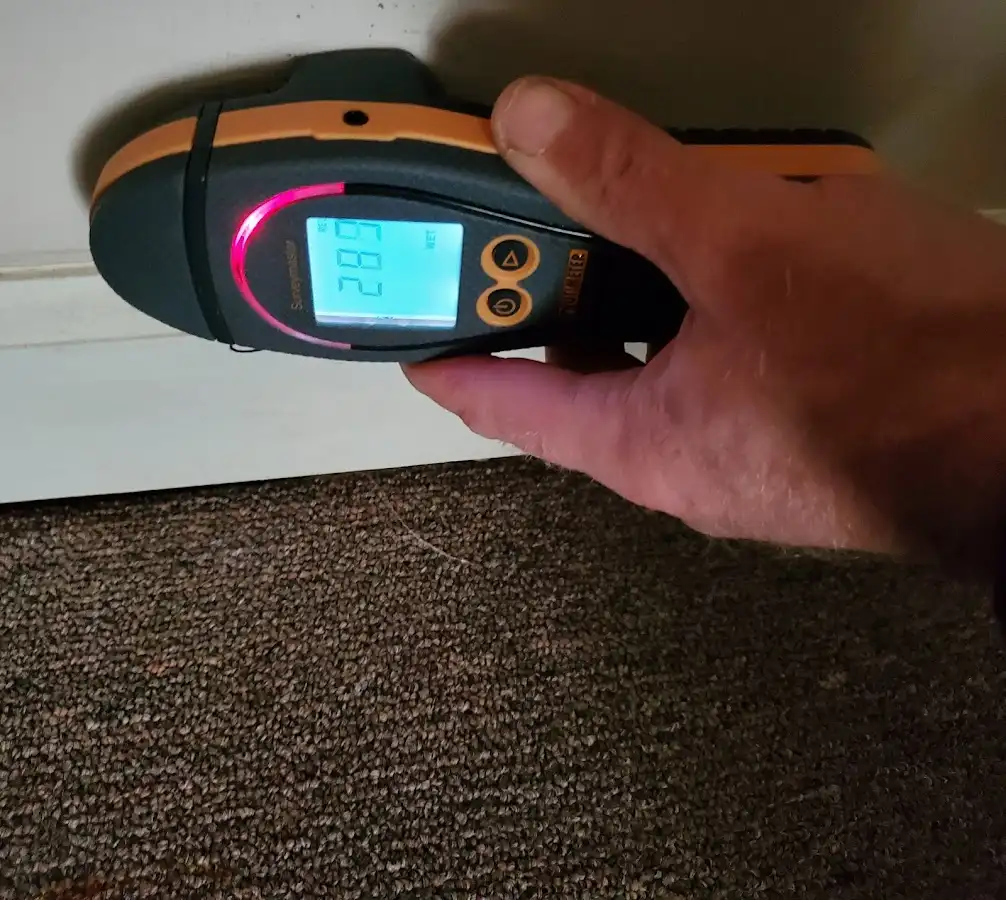 Moisture detection at baseboard during Storm Damage Restoration in Mabank